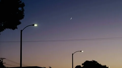 Sliver of moon at dusk Stockbeeldmateriaal 97492099