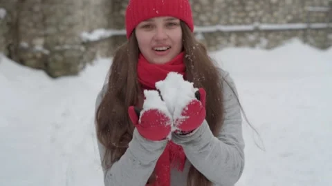 Slo-mo authentic cute happy beautiful young woman with long flowing hair in red Stock Footage 152982999