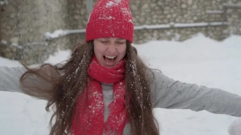 Slo-mo authentic cute happy beautiful young woman with long flowing hair in red Stock Footage 154146324