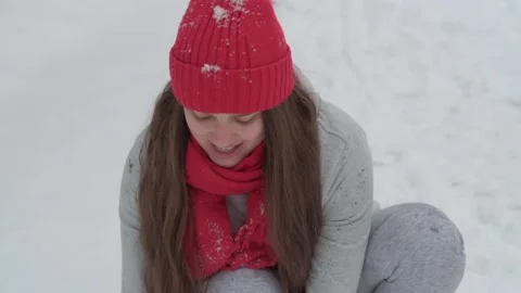 Slo-mo authentic cute happy beautiful young woman with long flowing hair in red Stock Footage 154437553