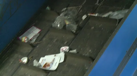 Slo-mo of blue waste facility conveyor (1 of 10) Stock Footage 32284103