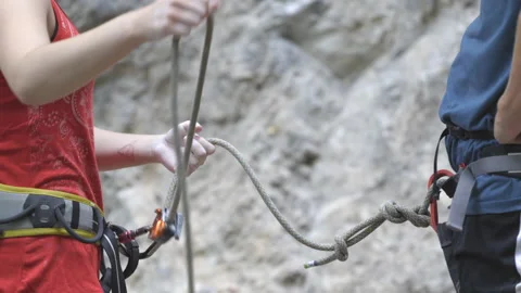 SLO MO Climbers preparing for belaying Stock Footage 208935237