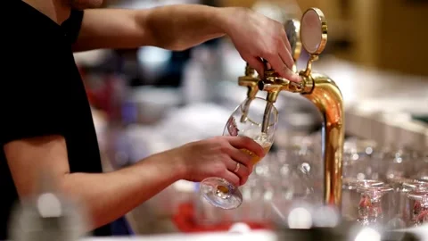 SLO MO Close up shot of pouring beer into a glass Super Slow Motion Detail Sh Stock Footage 265836737
