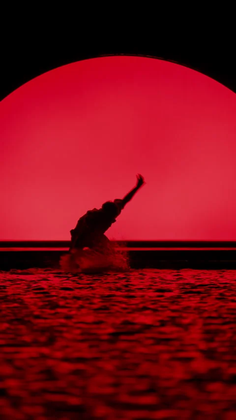 Slo-Mo Dancing In The Dark With Red Backlight Video stock 255538103