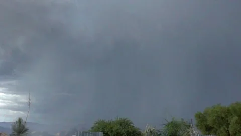 Slo mo daytime sheet lightning during Arizona monsoons Stock Footage 280856857