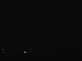 Slo mo of extreme night lightning with traffic 1 Video