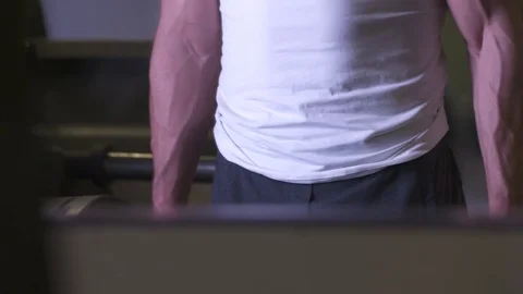  Slo-Mo Extremely cut young adult male curling dumbbells  Stock Footage 85317536