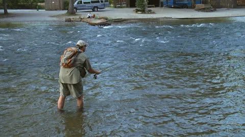 Slo-mo Guy Casts His Line Downstream Video stock 24705000