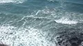 slo mo high angle view of Pacific ocean rip curl breakers coming to shore 4k or 4k+ Resolution