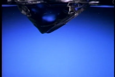 Slo-mo ice drop 4 Stock Footage 487073
