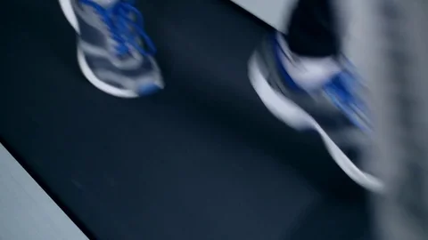 SLO MO LA Medium Shot Pan Man jogging on treadmill 動画素材 75355653