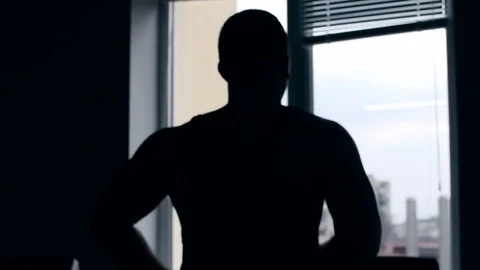 SLO MO LA Medium Shot Pan Man jogging on treadmill 動画素材 75355899