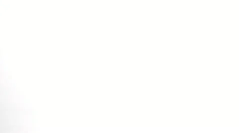 SLO MO MS Studio shot of two tomatoes falling against white background Stock Footage 11292601