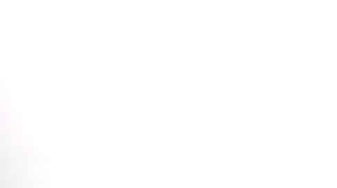 SLO MO MS Studio shot of three tomatoes falling against white background Stock Footage 51860140