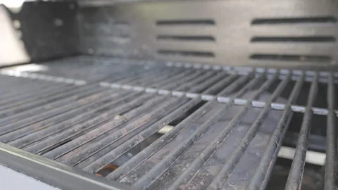 SLO MO Outside grill heating up Stock Footage 244993958