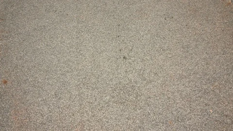 Slo-mo overhead view of biker riding a bicycle on the road Stock Footage 103770139