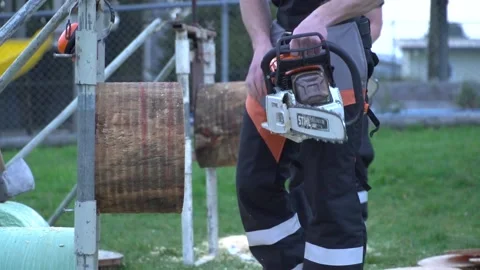 SLO MO Pick up and start ChainSaw Stock Footage 204954106