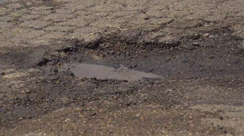 Slo Mo Pothole Stock Footage 35484363