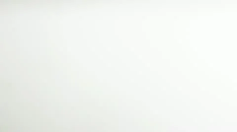 SLO MO SELECTIVE FOCUS CU Studio shot of Euro coins falling against white Stock Footage 11292797