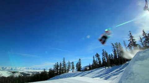 SLO-MO SNOWBOARD JUMP Stock Footage 1011872