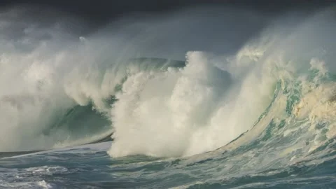 A slo-mo wave at Waimea bay during a large swell, North Shore, Oahu, Hawaii. Stock Footage 235773596