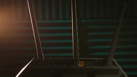 Slo mo of wi-fi routing device for local wireless and wired internet connection Stock Footage 340585709