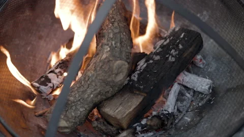 SLO MO Wood burning in a fire pit outside Stock Footage 201682411