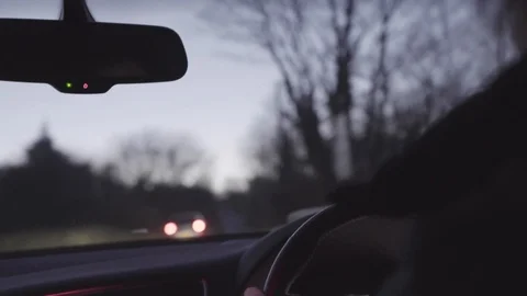 Slo motion in car close up steeing wheel at night Stock Footage 100443838