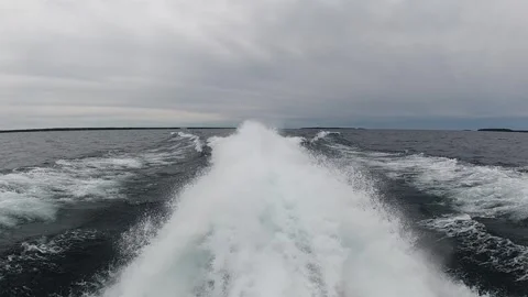 Slo motion Close up of turbo jets of a boat at speed. Water flows making waves Stock Footage 277453047