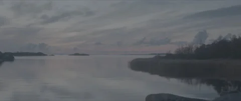 SLog shot of a calm sea at sunset Stock Footage 302353708