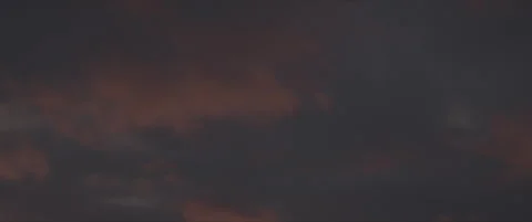 SLog shot of fiery clouds at twilight Stock Footage 302348896