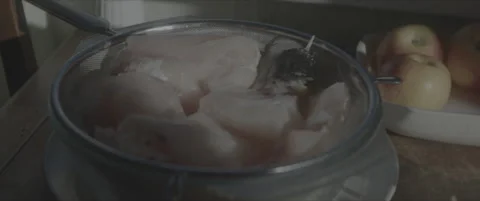 SLog shot of fresh fish draining in a colander Video stock 302352644