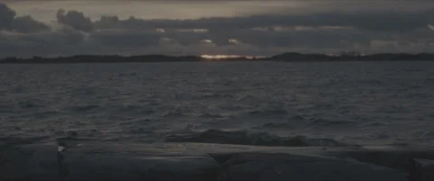 SLog shot of ocean waves at sunset Stock Footage 302346533