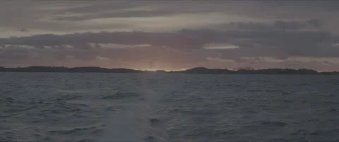 SLog shot of the sea with clouds at dusk Stock Footage 302348117