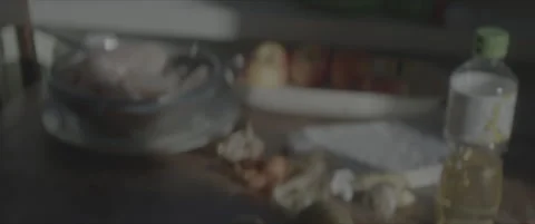 SLog shot of a wooden table with rustic kitchen ingredients Stock Footage 302352417
