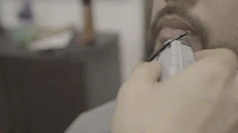 Slog2 close up shave slow mo gimball Stock Footage 99053258