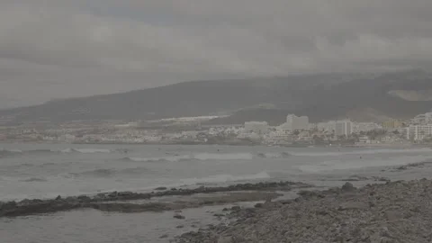 Slog3 Tenerife, beach view with cloudy mountains and city Stock Footage 328253799