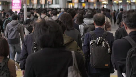 SLOMO Crowds of rush hour commuters in Tokyo from behind (editorial) Stock Footage 295404964