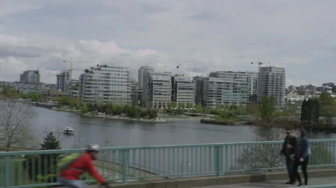 Slomo - High rises Streets Inlet People Stock Footage 46972420