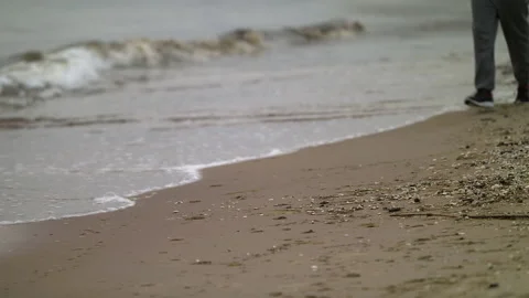 SloMo: Man with Beard Running by the Beach at Dusk - Close Up Shot Stock Footage 130728543