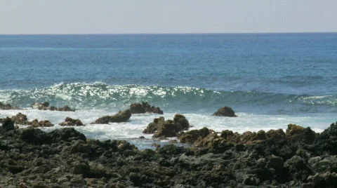 Slomo Waves Crashing on Rocks Stock Footage 418448