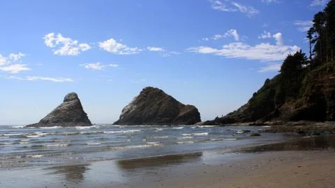 Slope leading to Sea Stack Stock Photos
