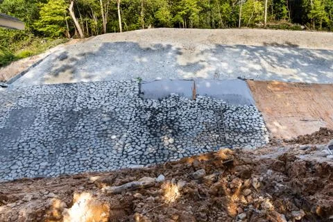 Slope retention construction work being carried out to manage landslide Stock Photos