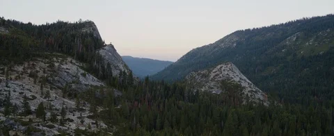 Slopes of mountain ranges covered with forest Stock Footage 92053050