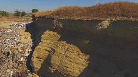 Slopes Of Quarry Littered With Garbage 스톡 동영상 61677962