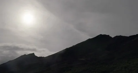 Slopes of rocky mountains at dusk Stock Footage 93602013