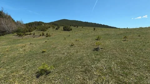 Slopes stretch under bright blue sky. Balkan, Eastern Europe, POV Stock Footage 333439871