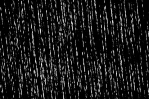 Sloping gray lines in the form of rain, gray stripes on a black background. イラスト素材