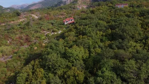 Sloping house in the mountains Stock Footage 167697010