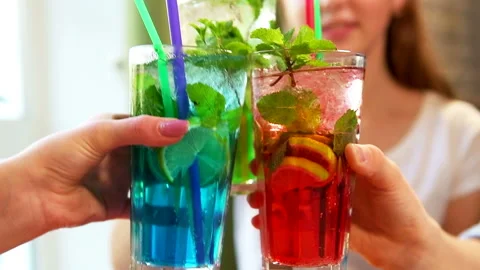 Сlose - up of glasses with colored cocktails Stock Footage